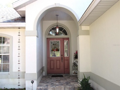 Charming three-bedroom, two-bathroom home featuring a two-car on Citrus Springs Country Club in Florida - for sale on GolfHomes.com, golf home, golf lot