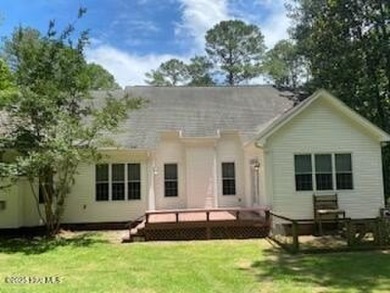 Gorgeous 3 bedroom, 3 bath home nestled  in a desirable golfing on Whispering Pines Golf Course in North Carolina - for sale on GolfHomes.com, golf home, golf lot