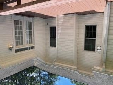 Gorgeous 3 bedroom, 3 bath home nestled  in a desirable golfing on Whispering Pines Golf Course in North Carolina - for sale on GolfHomes.com, golf home, golf lot