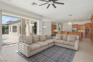 This unique residence offers a rare, oversized yard within the on Heritage Palms Golf and Country Club in Florida - for sale on GolfHomes.com, golf home, golf lot