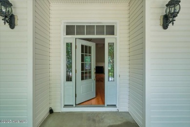 NEW PRICE!Gorgeous 3 bedroom, 3 bath home nestled  in a on Whispering Pines Golf Course in North Carolina - for sale on GolfHomes.com, golf home, golf lot
