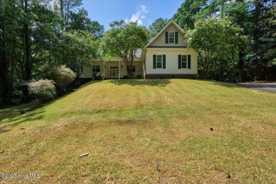 NEW PRICE!Gorgeous 3 bedroom, 3 bath home nestled  in a on Whispering Pines Golf Course in North Carolina - for sale on GolfHomes.com, golf home, golf lot