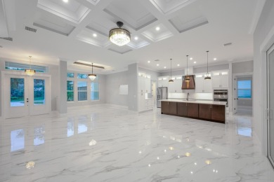Indulge in Opulent Living w/ this Exquisite 2023 Custom Build on Indian River Club in Florida - for sale on GolfHomes.com, golf home, golf lot