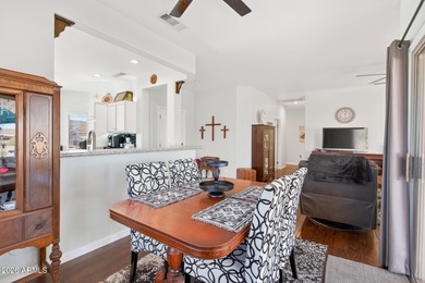 This beautifully remodeled Willow floor plan features walnut on Sun City Grand Golf Couse and Club in Arizona - for sale on GolfHomes.com, golf home, golf lot