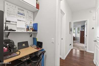 This beautifully remodeled Willow floor plan features walnut on Sun City Grand Golf Couse and Club in Arizona - for sale on GolfHomes.com, golf home, golf lot