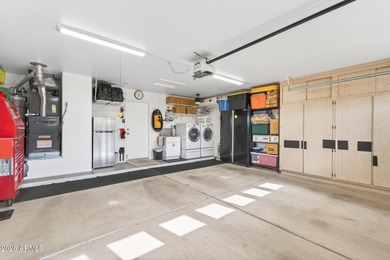 This beautifully remodeled Willow floor plan features walnut on Sun City Grand Golf Couse and Club in Arizona - for sale on GolfHomes.com, golf home, golf lot