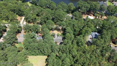 NEW PRICE!Gorgeous 3 bedroom, 3 bath home nestled  in a on Whispering Pines Golf Course in North Carolina - for sale on GolfHomes.com, golf home, golf lot