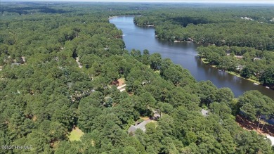 NEW PRICE!Gorgeous 3 bedroom, 3 bath home nestled  in a on Whispering Pines Golf Course in North Carolina - for sale on GolfHomes.com, golf home, golf lot