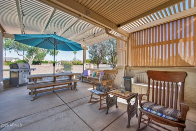 This beautifully remodeled Willow floor plan features walnut on Sun City Grand Golf Couse and Club in Arizona - for sale on GolfHomes.com, golf home, golf lot