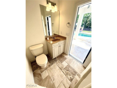 This unique residence offers a rare, oversized yard within the on Heritage Palms Golf and Country Club in Florida - for sale on GolfHomes.com, golf home, golf lot