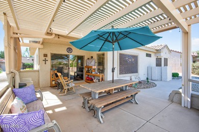 This beautifully remodeled Willow floor plan features walnut on Sun City Grand Golf Couse and Club in Arizona - for sale on GolfHomes.com, golf home, golf lot