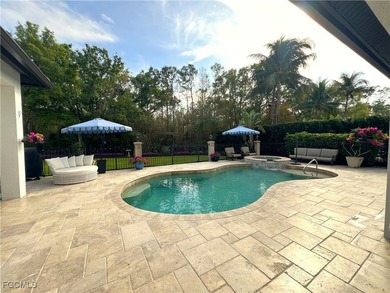 This unique residence offers a rare, oversized yard within the on Heritage Palms Golf and Country Club in Florida - for sale on GolfHomes.com, golf home, golf lot