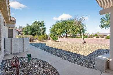 This beautifully remodeled Willow floor plan features walnut on Sun City Grand Golf Couse and Club in Arizona - for sale on GolfHomes.com, golf home, golf lot