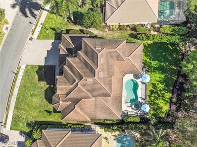 This unique residence offers a rare, oversized yard within the on Heritage Palms Golf and Country Club in Florida - for sale on GolfHomes.com, golf home, golf lot