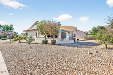 This beautifully remodeled Willow floor plan features walnut on Sun City Grand Golf Couse and Club in Arizona - for sale on GolfHomes.com, golf home, golf lot