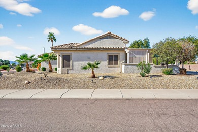 This beautifully remodeled Willow floor plan features walnut on Sun City Grand Golf Couse and Club in Arizona - for sale on GolfHomes.com, golf home, golf lot