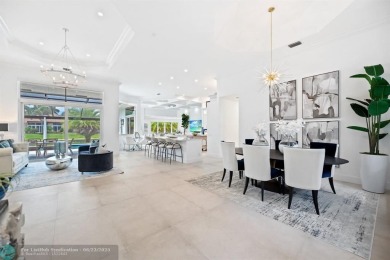 Stunning Luxury waterfront pool home in exclusive Weston Hills on Weston Hills Country Club in Florida - for sale on GolfHomes.com, golf home, golf lot