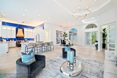 Stunning Luxury waterfront pool home in exclusive Weston Hills on Weston Hills Country Club in Florida - for sale on GolfHomes.com, golf home, golf lot