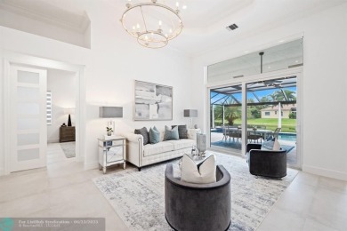 Stunning Luxury waterfront pool home in exclusive Weston Hills on Weston Hills Country Club in Florida - for sale on GolfHomes.com, golf home, golf lot