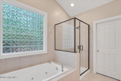 NEW PRICE!Gorgeous 3 bedroom, 3 bath home nestled  in a on Whispering Pines Golf Course in North Carolina - for sale on GolfHomes.com, golf home, golf lot