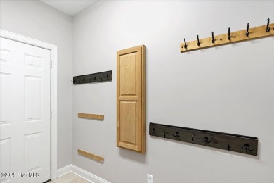NEW PRICE!Gorgeous 3 bedroom, 3 bath home nestled  in a on Whispering Pines Golf Course in North Carolina - for sale on GolfHomes.com, golf home, golf lot