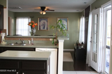 Welcome home! This well-loved home is located minutes from the on Eagle Creek Golf Club and Grill in North Carolina - for sale on GolfHomes.com, golf home, golf lot