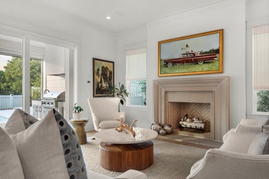 This Stunning 5-bedroom, 5.5-bath luxury residence overlooks the on Origins Golf Club in Florida - for sale on GolfHomes.com, golf home, golf lot