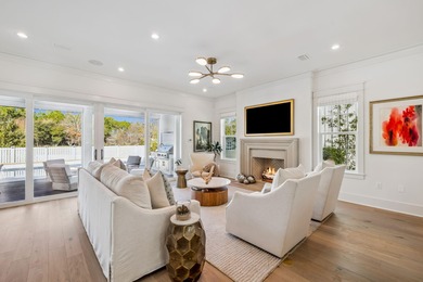 This Stunning 5-bedroom, 5.5-bath luxury residence overlooks the on Origins Golf Club in Florida - for sale on GolfHomes.com, golf home, golf lot