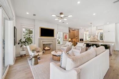 This Stunning 5-bedroom, 5.5-bath luxury residence overlooks the on Origins Golf Club in Florida - for sale on GolfHomes.com, golf home, golf lot