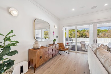 This Stunning 5-bedroom, 5.5-bath luxury residence overlooks the on Origins Golf Club in Florida - for sale on GolfHomes.com, golf home, golf lot