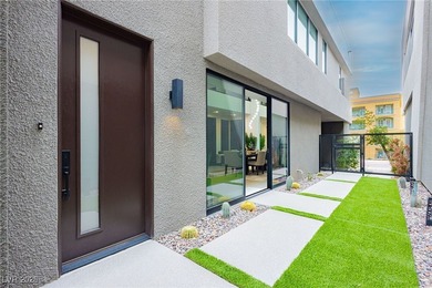 Beautifully Crafted modern residence in the highly sought-after on South Shore At Lake Las Vegas in Nevada - for sale on GolfHomes.com, golf home, golf lot