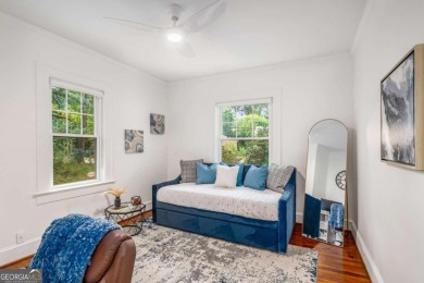 This 3-bedroom, 2-bath brick bungalow blends timeless character on College Park Municipal Golf Course in Georgia - for sale on GolfHomes.com, golf home, golf lot