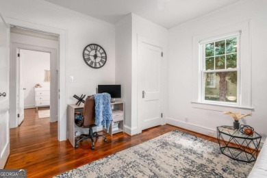 This 3-bedroom, 2-bath brick bungalow blends timeless character on College Park Municipal Golf Course in Georgia - for sale on GolfHomes.com, golf home, golf lot