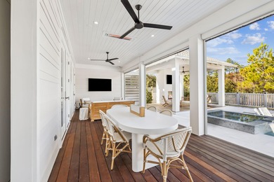 This Stunning 5-bedroom, 5.5-bath luxury residence overlooks the on Origins Golf Club in Florida - for sale on GolfHomes.com, golf home, golf lot