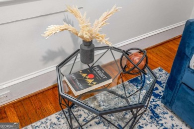 This 3-bedroom, 2-bath brick bungalow blends timeless character on College Park Municipal Golf Course in Georgia - for sale on GolfHomes.com, golf home, golf lot