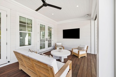 This Stunning 5-bedroom, 5.5-bath luxury residence overlooks the on Origins Golf Club in Florida - for sale on GolfHomes.com, golf home, golf lot