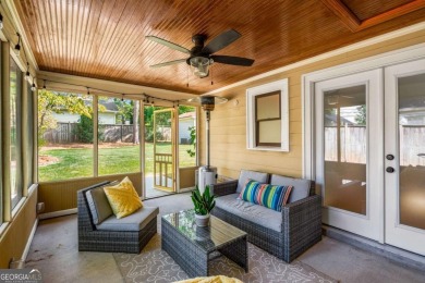 This 3-bedroom, 2-bath brick bungalow blends timeless character on College Park Municipal Golf Course in Georgia - for sale on GolfHomes.com, golf home, golf lot
