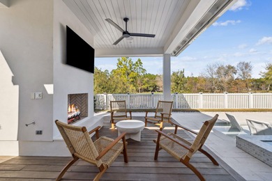 This Stunning 5-bedroom, 5.5-bath luxury residence overlooks the on Origins Golf Club in Florida - for sale on GolfHomes.com, golf home, golf lot