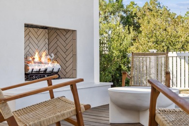 This Stunning 5-bedroom, 5.5-bath luxury residence overlooks the on Origins Golf Club in Florida - for sale on GolfHomes.com, golf home, golf lot