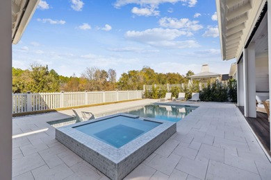 This Stunning 5-bedroom, 5.5-bath luxury residence overlooks the on Origins Golf Club in Florida - for sale on GolfHomes.com, golf home, golf lot