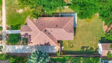 This 3-bedroom, 2-bath brick bungalow blends timeless character on College Park Municipal Golf Course in Georgia - for sale on GolfHomes.com, golf home, golf lot