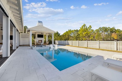 This Stunning 5-bedroom, 5.5-bath luxury residence overlooks the on Origins Golf Club in Florida - for sale on GolfHomes.com, golf home, golf lot