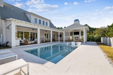 This Stunning 5-bedroom, 5.5-bath luxury residence overlooks the on Origins Golf Club in Florida - for sale on GolfHomes.com, golf home, golf lot