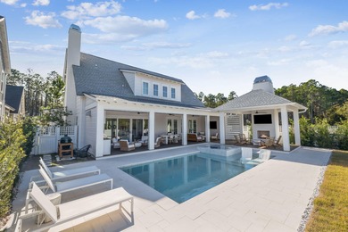 This Stunning 5-bedroom, 5.5-bath luxury residence overlooks the on Origins Golf Club in Florida - for sale on GolfHomes.com, golf home, golf lot