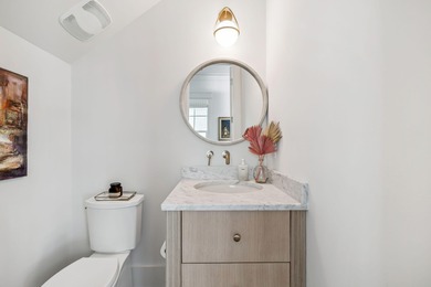 This Stunning 5-bedroom, 5.5-bath luxury residence overlooks the on Origins Golf Club in Florida - for sale on GolfHomes.com, golf home, golf lot