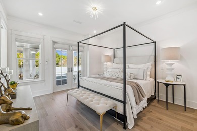 This Stunning 5-bedroom, 5.5-bath luxury residence overlooks the on Origins Golf Club in Florida - for sale on GolfHomes.com, golf home, golf lot