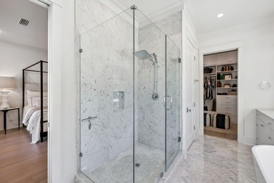 This Stunning 5-bedroom, 5.5-bath luxury residence overlooks the on Origins Golf Club in Florida - for sale on GolfHomes.com, golf home, golf lot