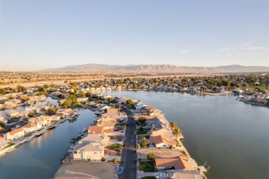 Must See! This beautiful 3-bedroom, 2-bathroom home is a gem on Spring Valley Lake Country Club in California - for sale on GolfHomes.com, golf home, golf lot