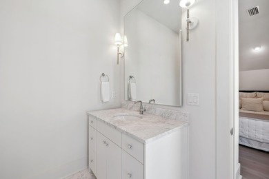 This Stunning 5-bedroom, 5.5-bath luxury residence overlooks the on Origins Golf Club in Florida - for sale on GolfHomes.com, golf home, golf lot