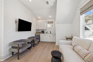 This Stunning 5-bedroom, 5.5-bath luxury residence overlooks the on Origins Golf Club in Florida - for sale on GolfHomes.com, golf home, golf lot